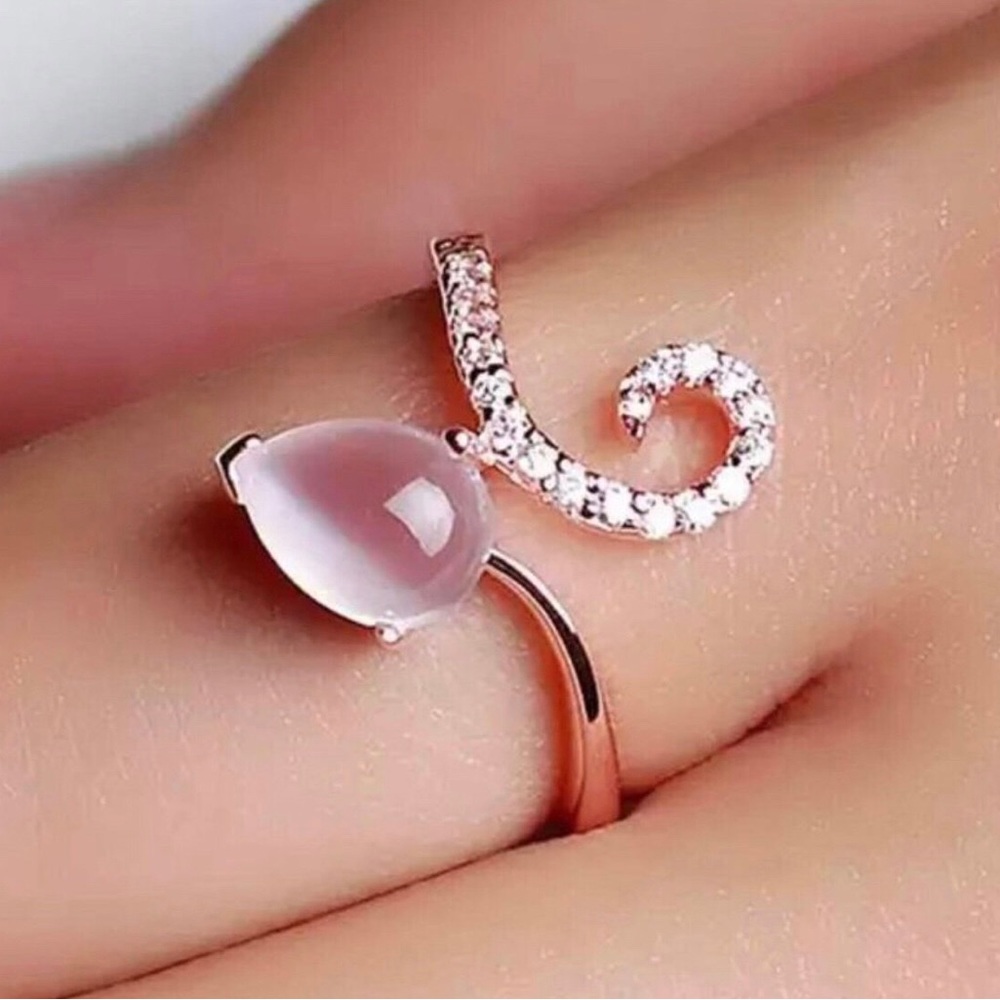 Rose gold and opal ring